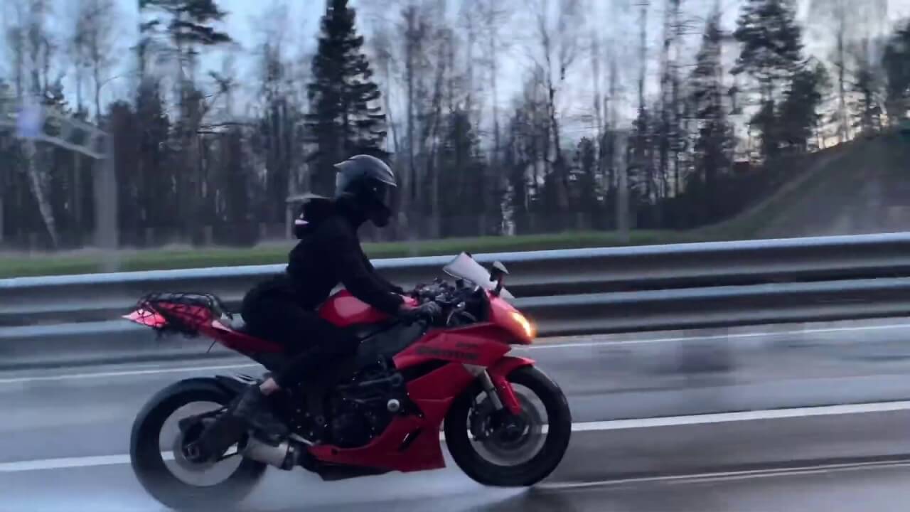 motorcycle speed in the rain.